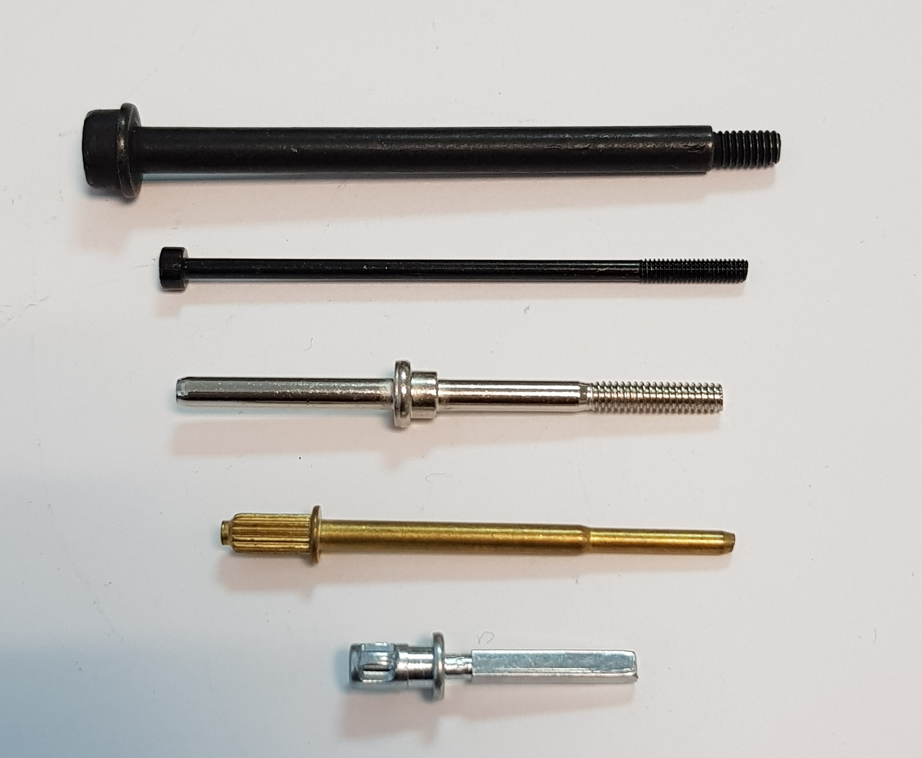 Multi-die formed screws and shafts